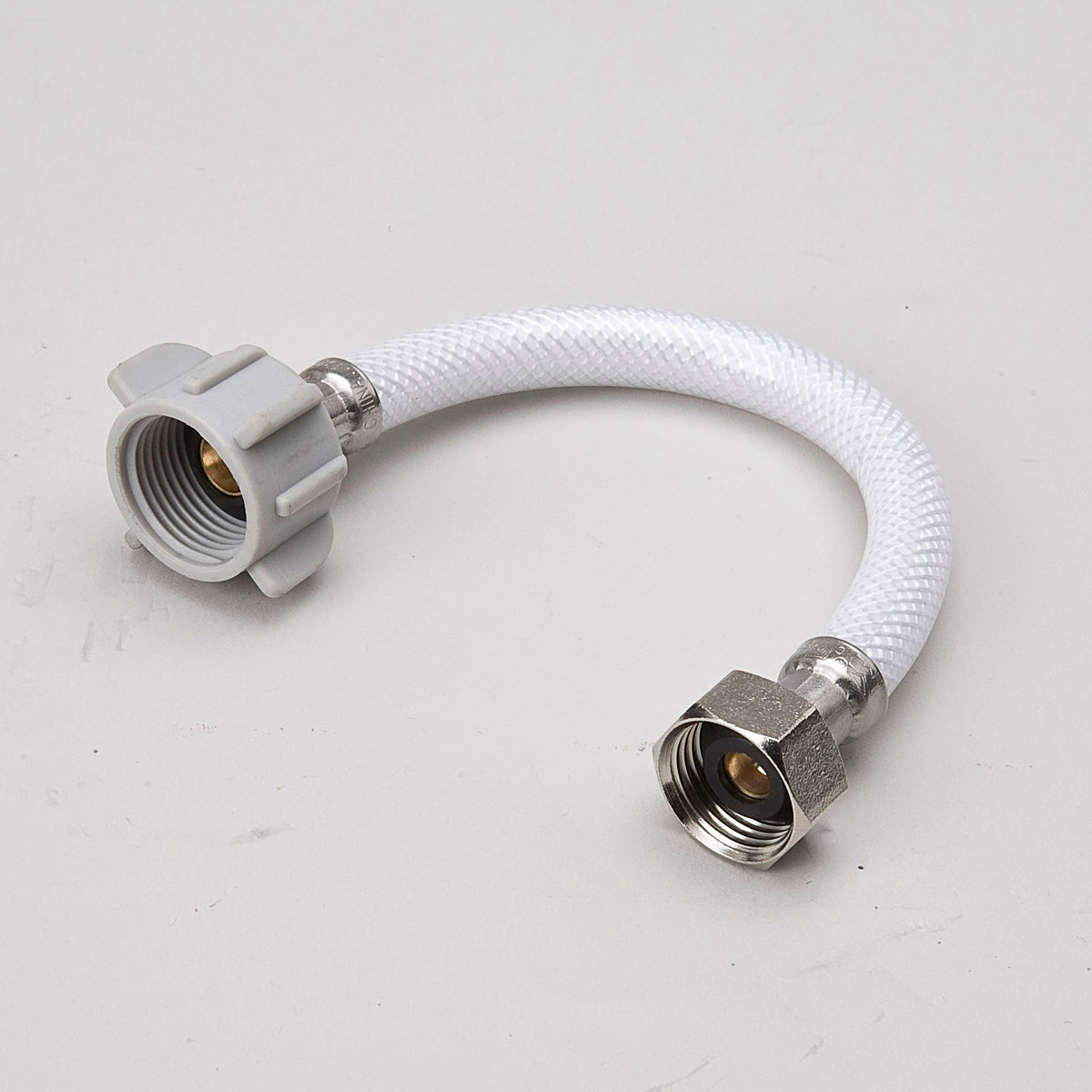1/2-in FIP x 7/8-in BC x 9-in PVC Toilet Supply Line - Fittings N' Valves